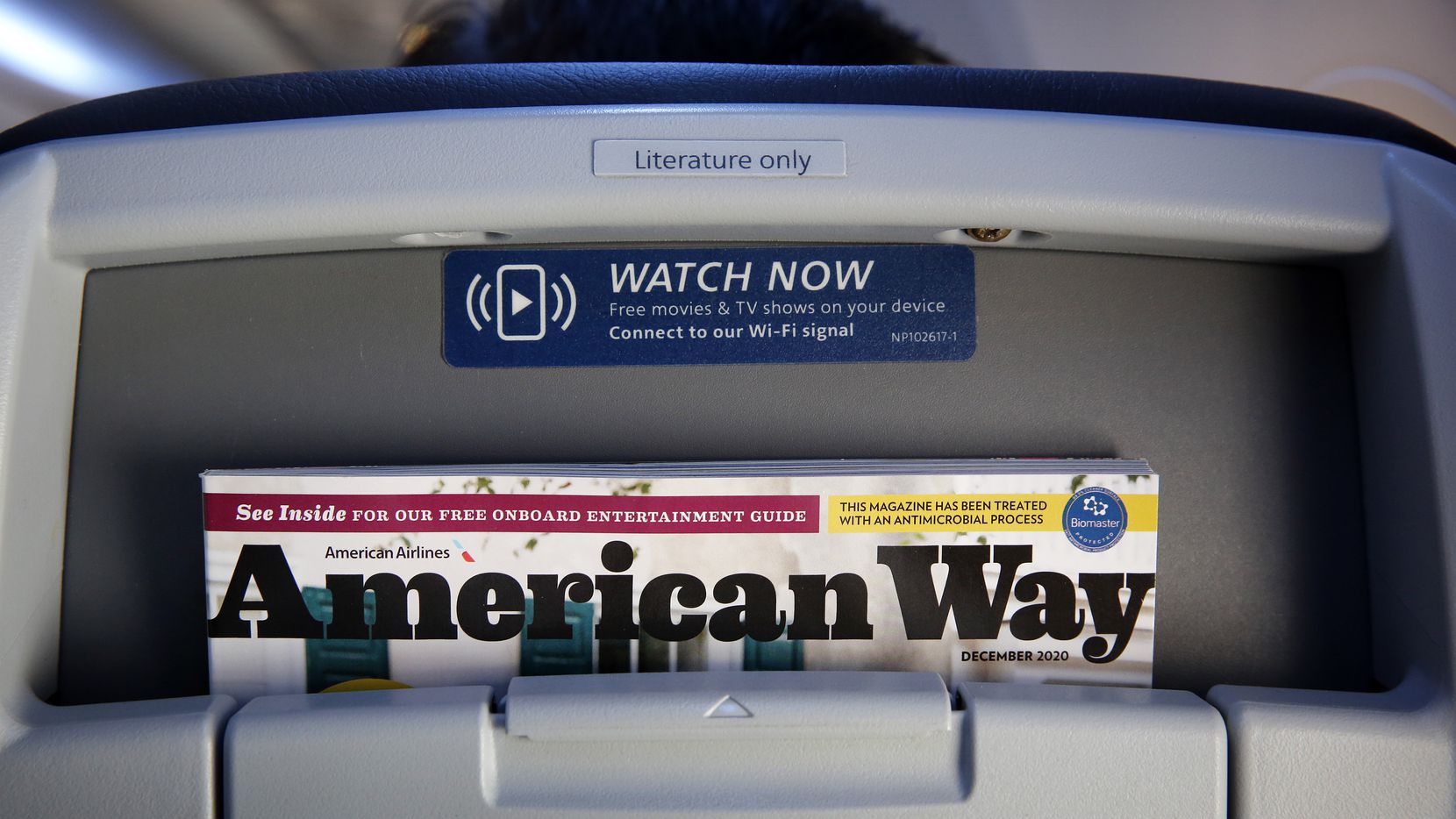 American Way en el asiento de un avión de American Airlines